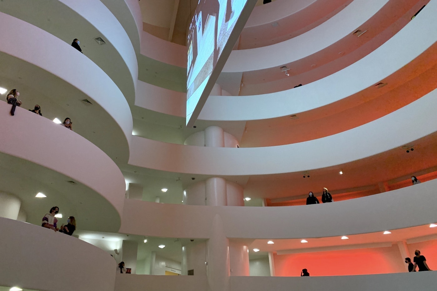 Inside the Guggenheim Museum, staring up the rotunda into a spiral walkway